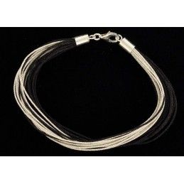 Bracelet fil de soie noir et argenté avec fermoir en argent.