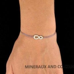 Bracelet infini zirconium et cordon.