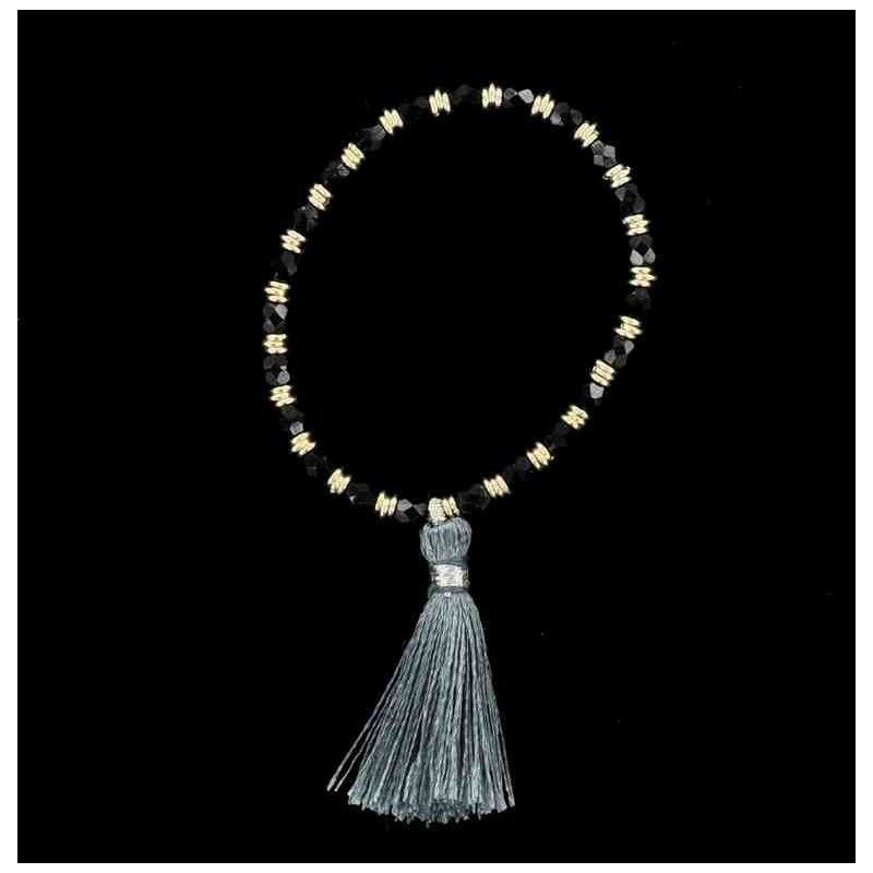 Bracelet perles d'onyx facettées, anneaux et pompon.