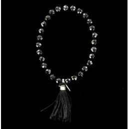 Bracelet perles d'onyx noir facettées et pompon.