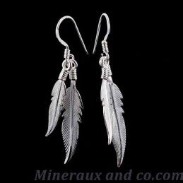 Boucles d'oreilles quatre plumes.