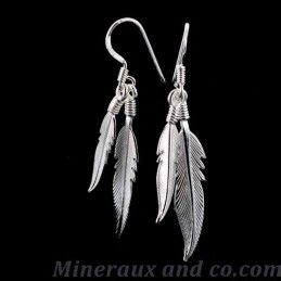 Boucles d'oreilles quatre plumes.