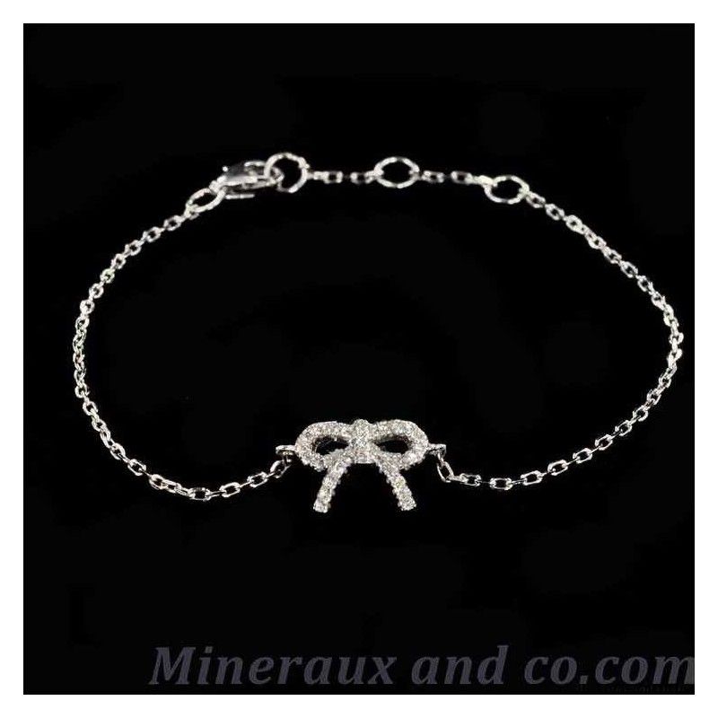 Bracelet noeud argent serti.