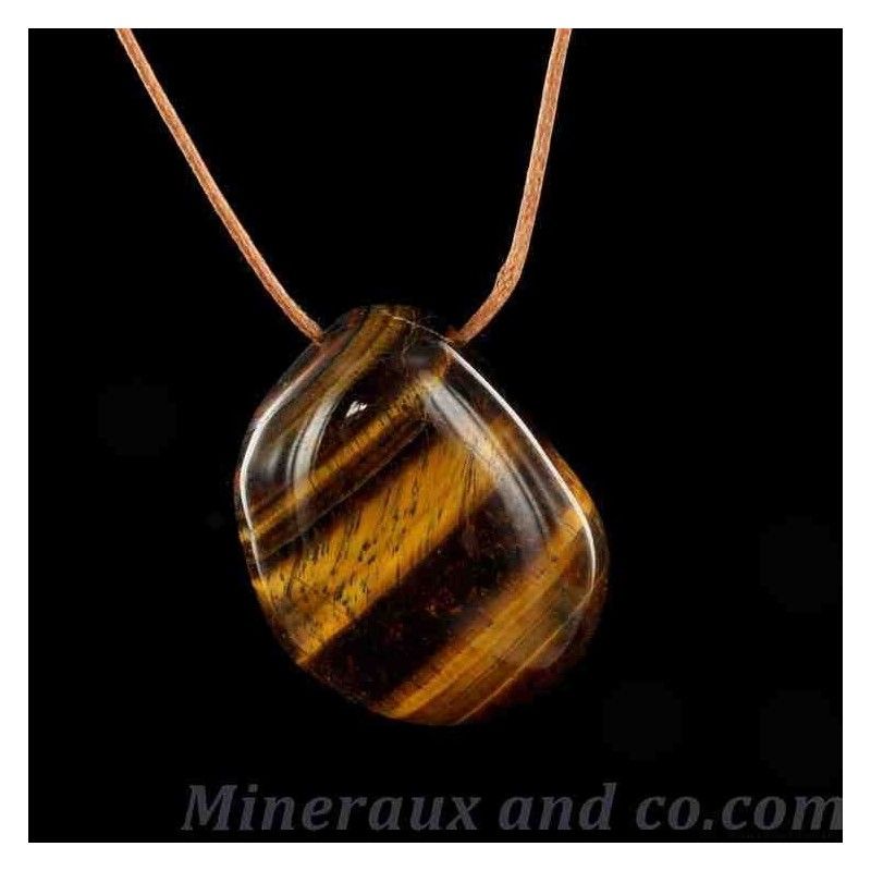Pendentif œil de tigre en pierre roulée et lacet cordon . Pendentif œil de tigre en pierre roulée et lacet cordon .