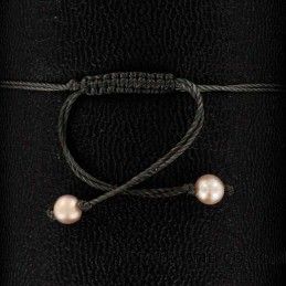 Bracelet cordon et 3 perles de culture d'eau douce roses.