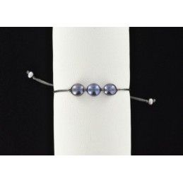 Bracelet cordon et 3 perles de culture d'eau douce noires.